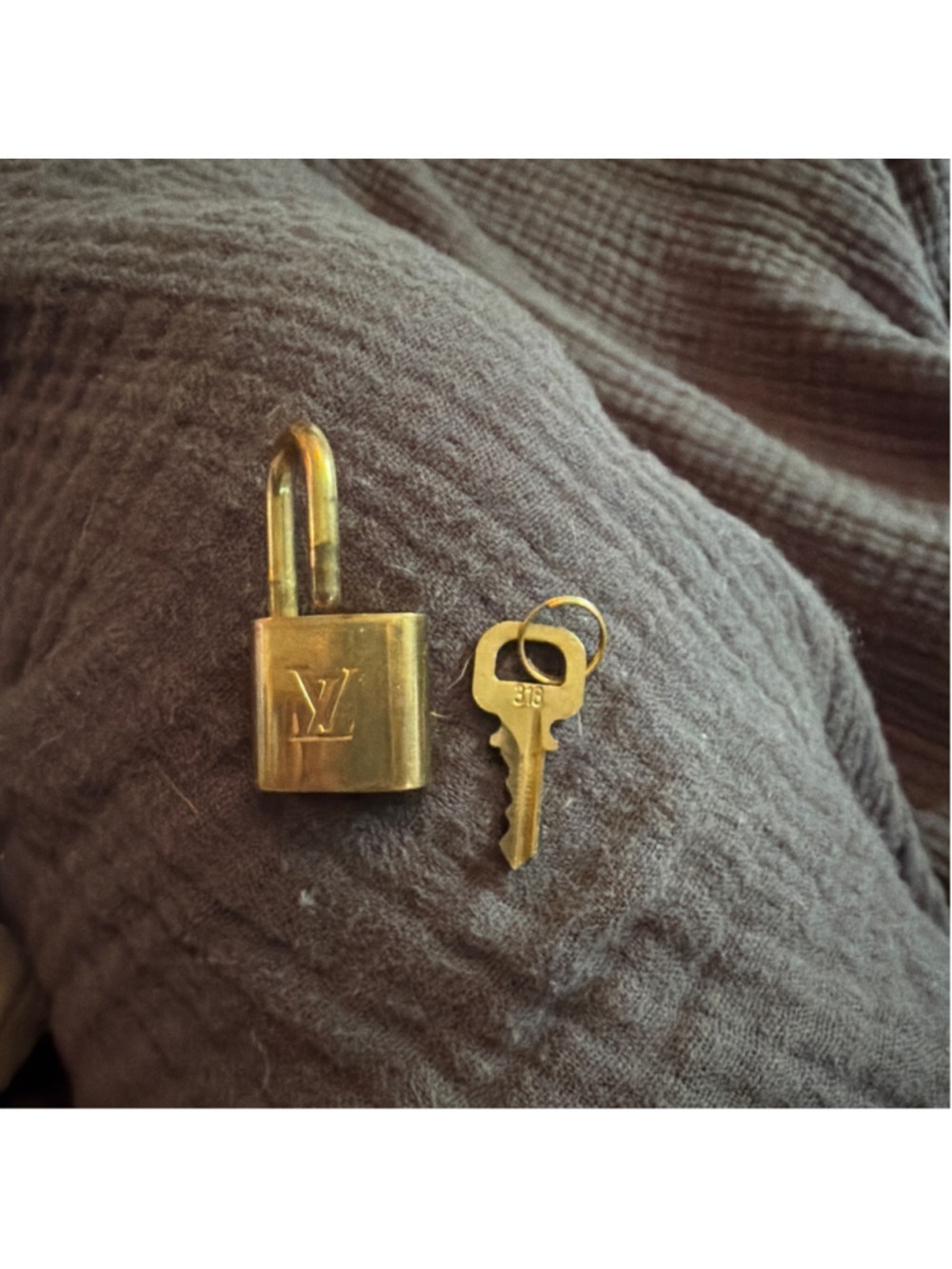 Louis Vuitton Gold Padlock and Key One Size